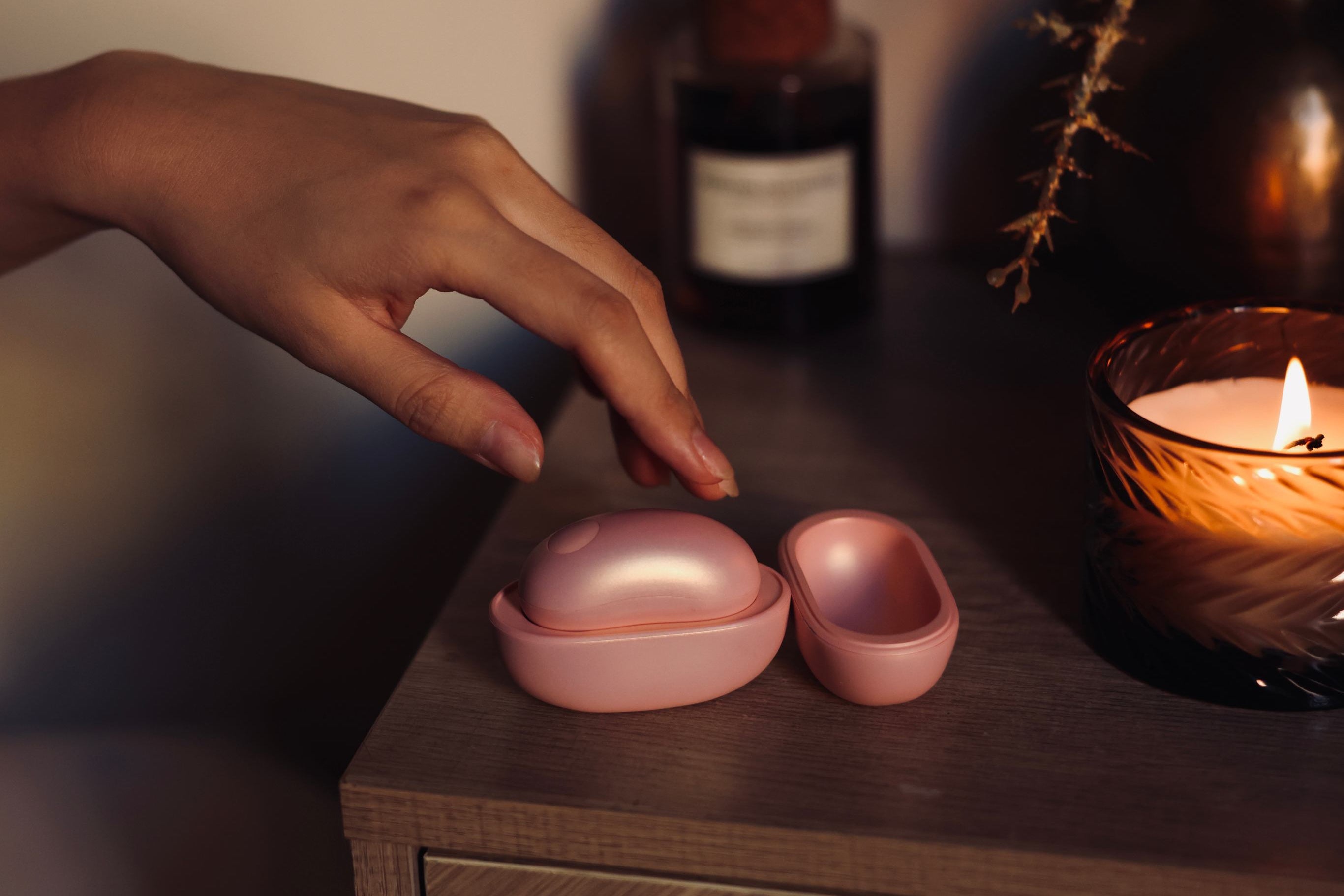 Veluna Cove mini personal massager in a calm, intimate setting