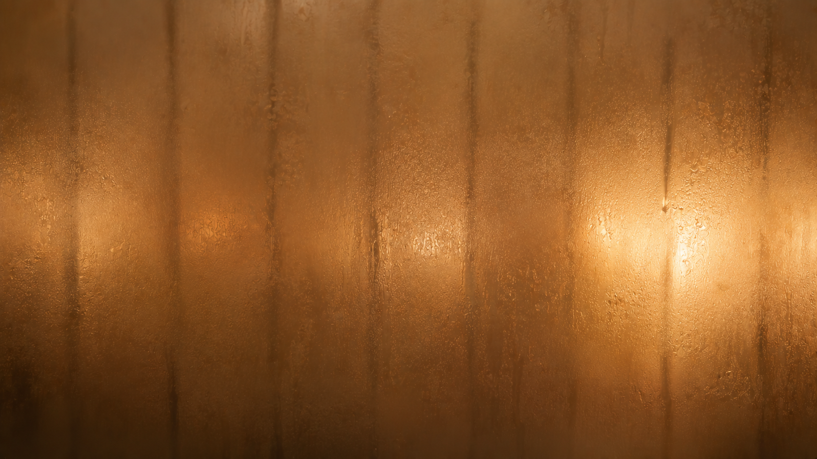 Textured gold background with a warm glow
