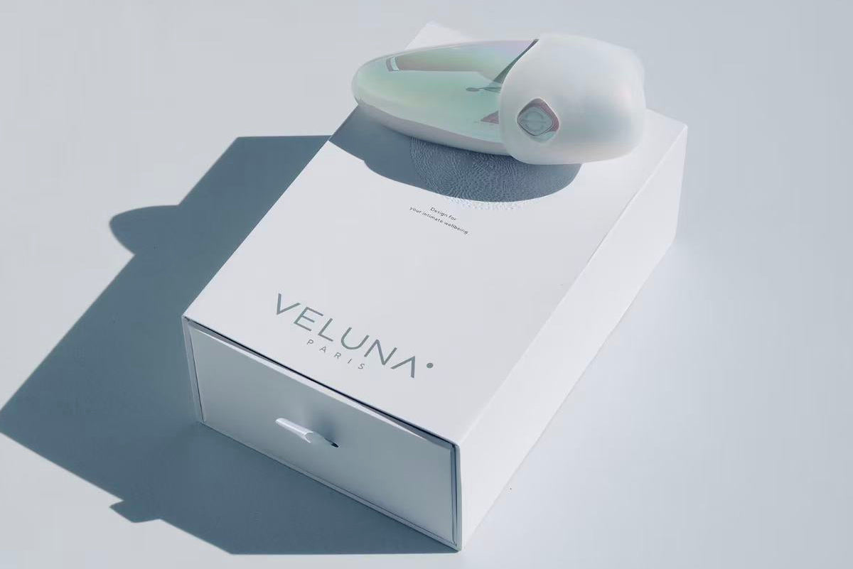 Veluna Drift ergonomic personal massager with minimalist packaging