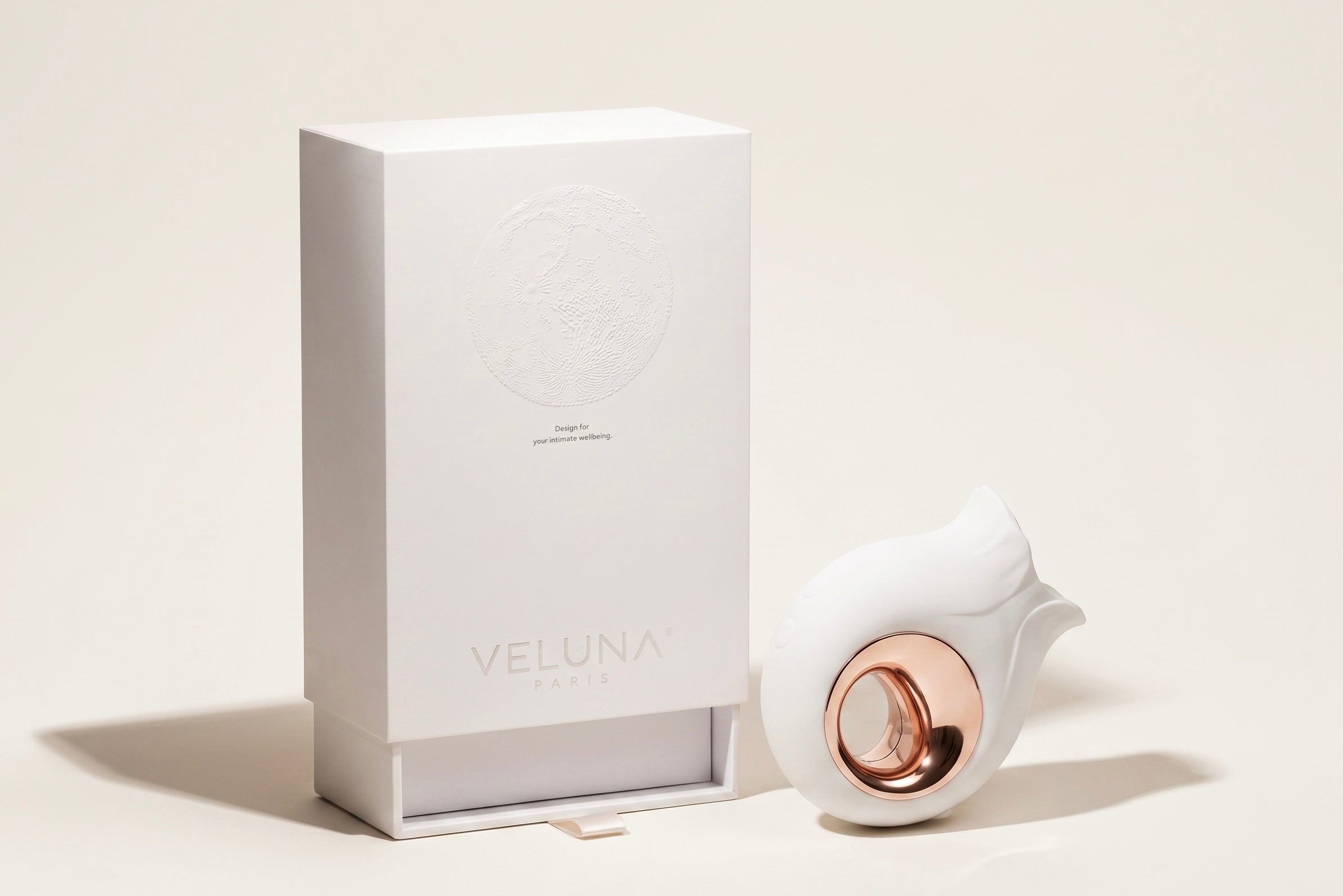Veluna Halo personal massager with minimalist packaging